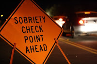 Checkpoints must be clearly identified in a manner that a driver can avoid the checkpoint after noticing the sign.